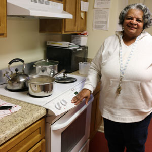 DSP Annette Ross takes a break at Monarch's Circle Drive Group Home kitchen.